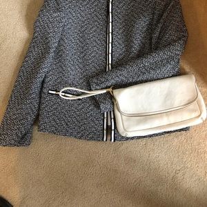 Ivory leather wristlet/clutch.